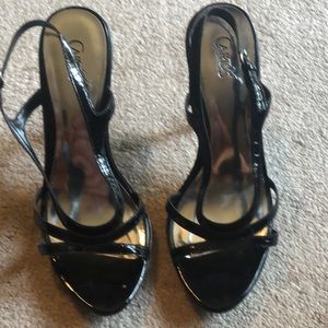 Strapped black high heels